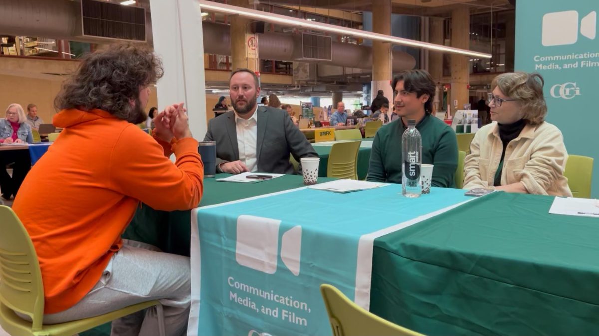 Communications, Media, and Film Pathway with Sandra Luzzi Sneesby (left) Chair and Professor
Department of Communication and Media, Luis Paz (middle) Office Manager, Communication and Media Department English Department, and Jesse Tolppa (left) talking with student.