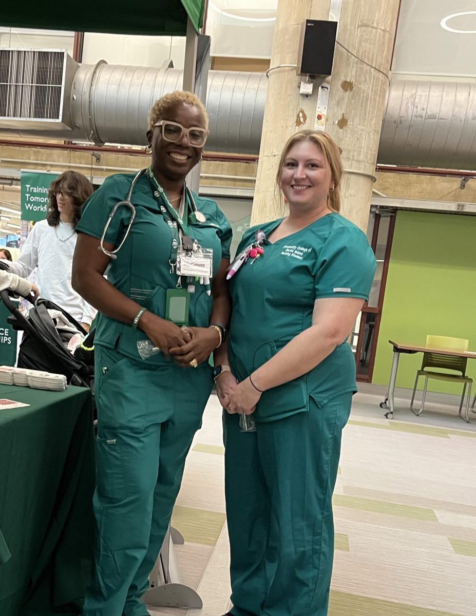Two CCRI Nursing Students pose for photo.